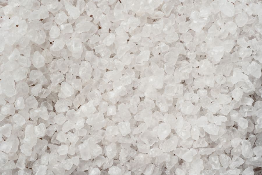 A dense bed of coarse white mineral crystals filling the frame.
